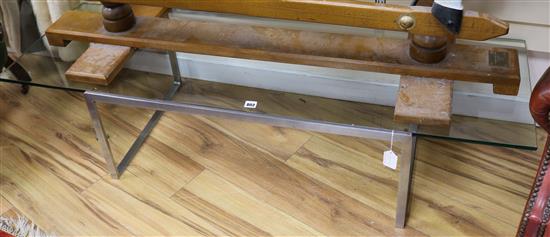William Plunkett?. A chrome framed coffee table with plate glass top W.152cm